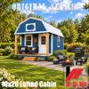 Blue 10x20 lofted cabin styled as a backyard man cave with porch seating, a dartboard, patio, fire pit, and grill.